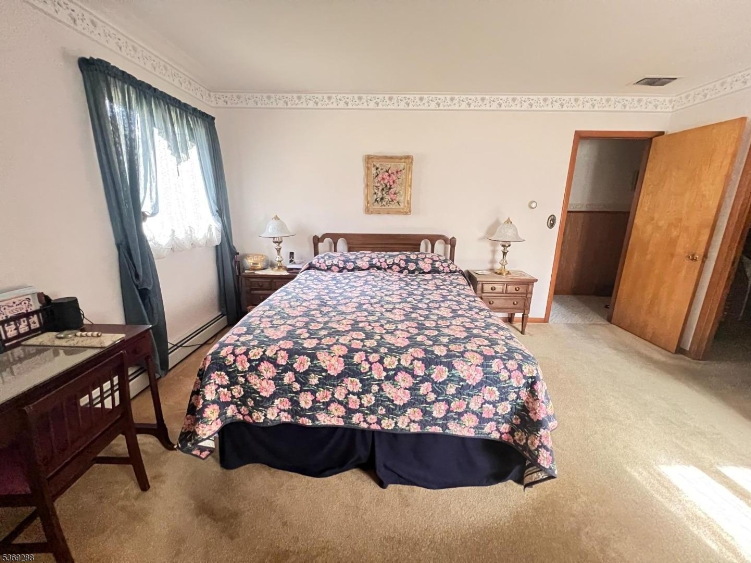 15 Luff Road Boonton, NJ 07005 - Photo 19 of 43 a large bed sitting in a bedroom next to a window