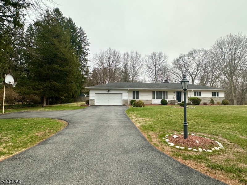 15 Luff Road Boonton, NJ 07005 - Photo 2 of 43 a view of a big house with a big yard and large tree