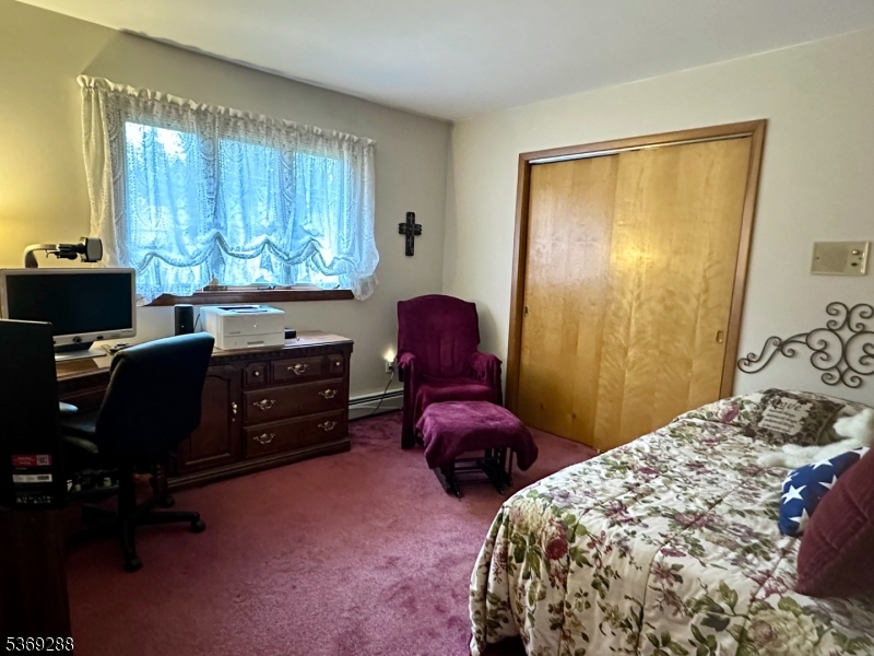 15 Luff Road Boonton, NJ 07005 - Photo 23 of 43 a bedroom with a bed and a window