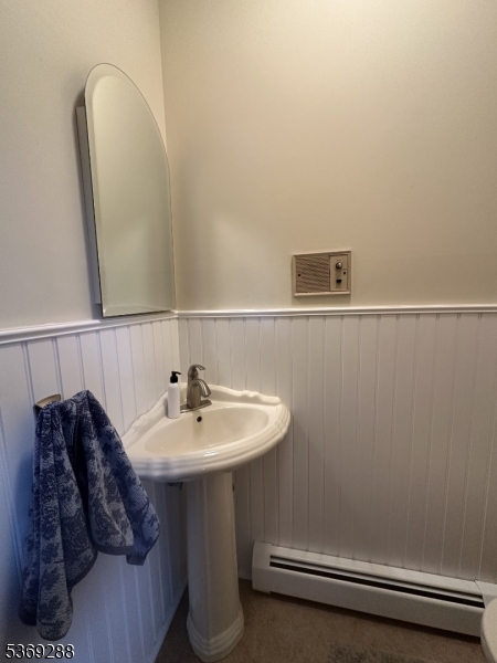 15 Luff Road Boonton, NJ 07005 - Photo 28 of 43 a bathroom with a sink and a mirror