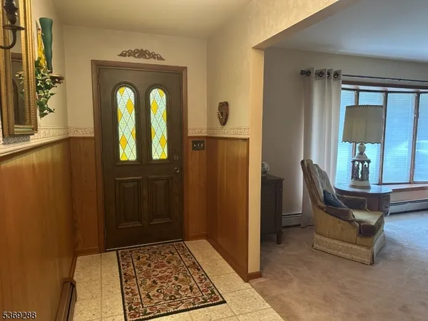 a view of livingroom with furniture and wooden floor