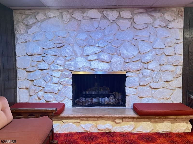 15 Luff Road Boonton, NJ 07005 - Photo 31 of 43 a living room with a couch and a fireplace