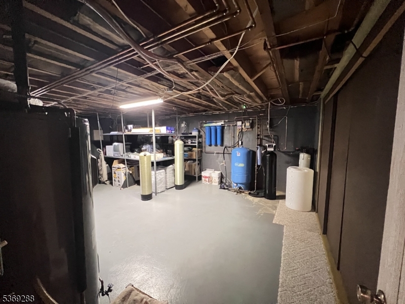 15 Luff Road Boonton, NJ 07005 - Photo 38 of 43 a view of the storage and utility room with racks