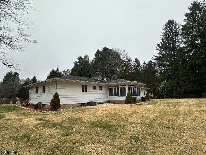 15 Luff Road Boonton, NJ 07005 - Photo 42 of 43 a front view of a house with a yard