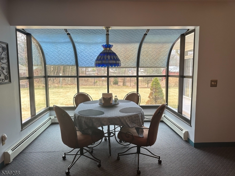 15 Luff Road Boonton, NJ 07005 - Photo 8 of 43 a view of a dining room with furniture and a window