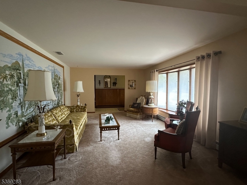 15 Luff Road Boonton, NJ 07005 - Photo 10 of 43 a living room with furniture and a large window