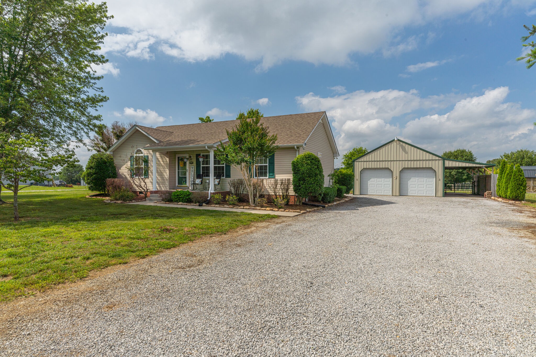 220 Old Martin Chapel Road Portland, TN 37148 - Photo 1 of 31 a front view of house with yard and green space