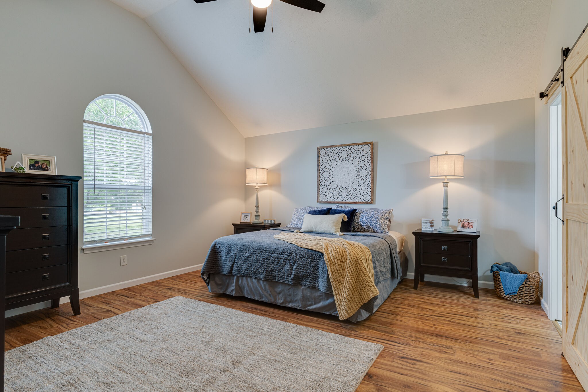 220 Old Martin Chapel Road Portland, TN 37148 - Photo 13 of 31 a spacious bedroom with a bed and wooden floor