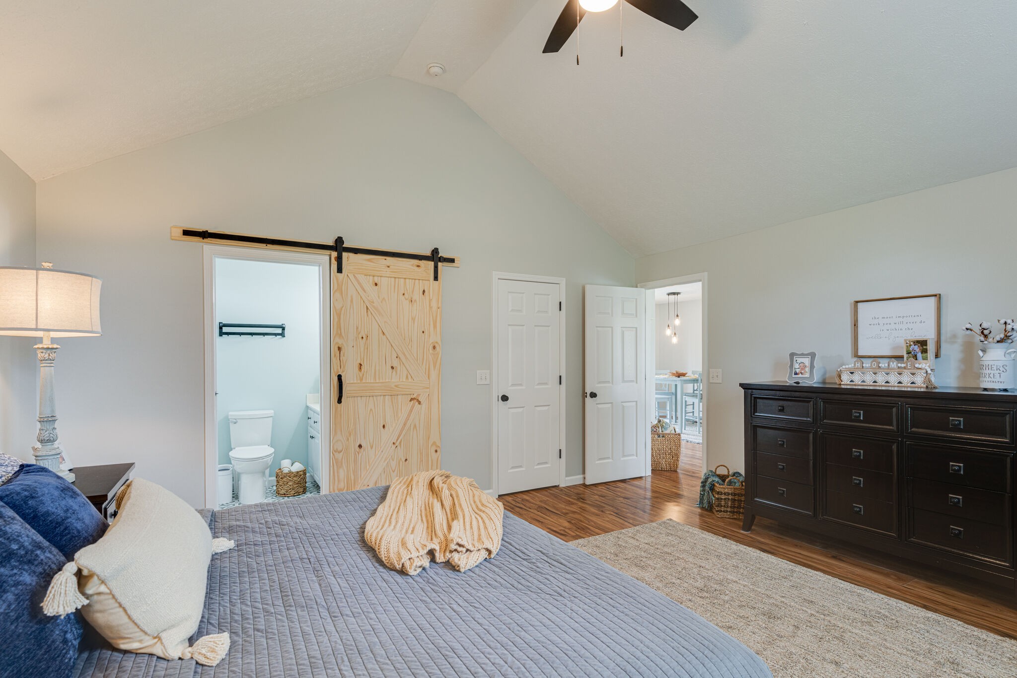 220 Old Martin Chapel Road Portland, TN 37148 - Photo 14 of 31 a bedroom with a bed and wooden floor
