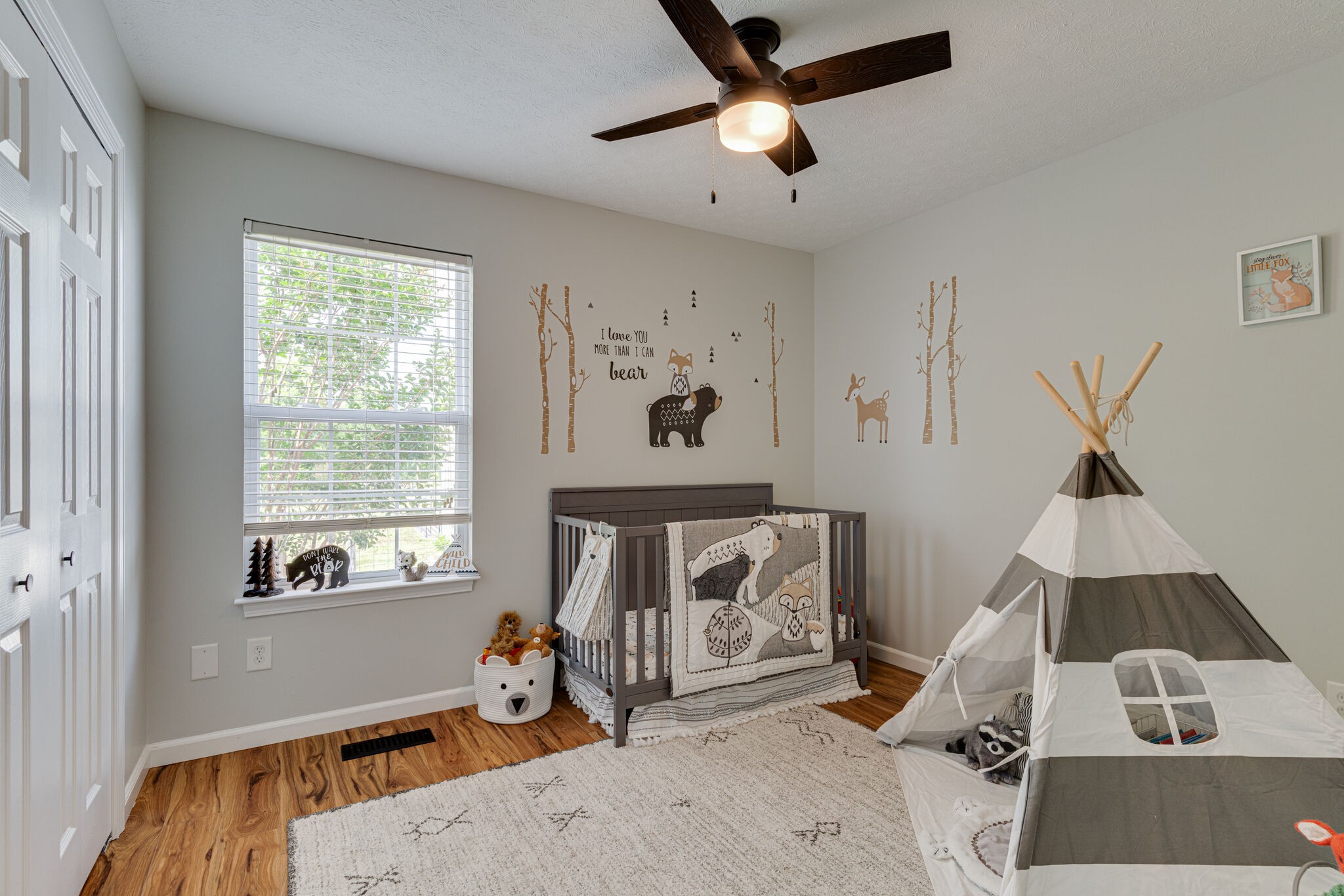 220 Old Martin Chapel Road Portland, TN 37148 - Photo 17 of 31 a bedroom with furniture and a window