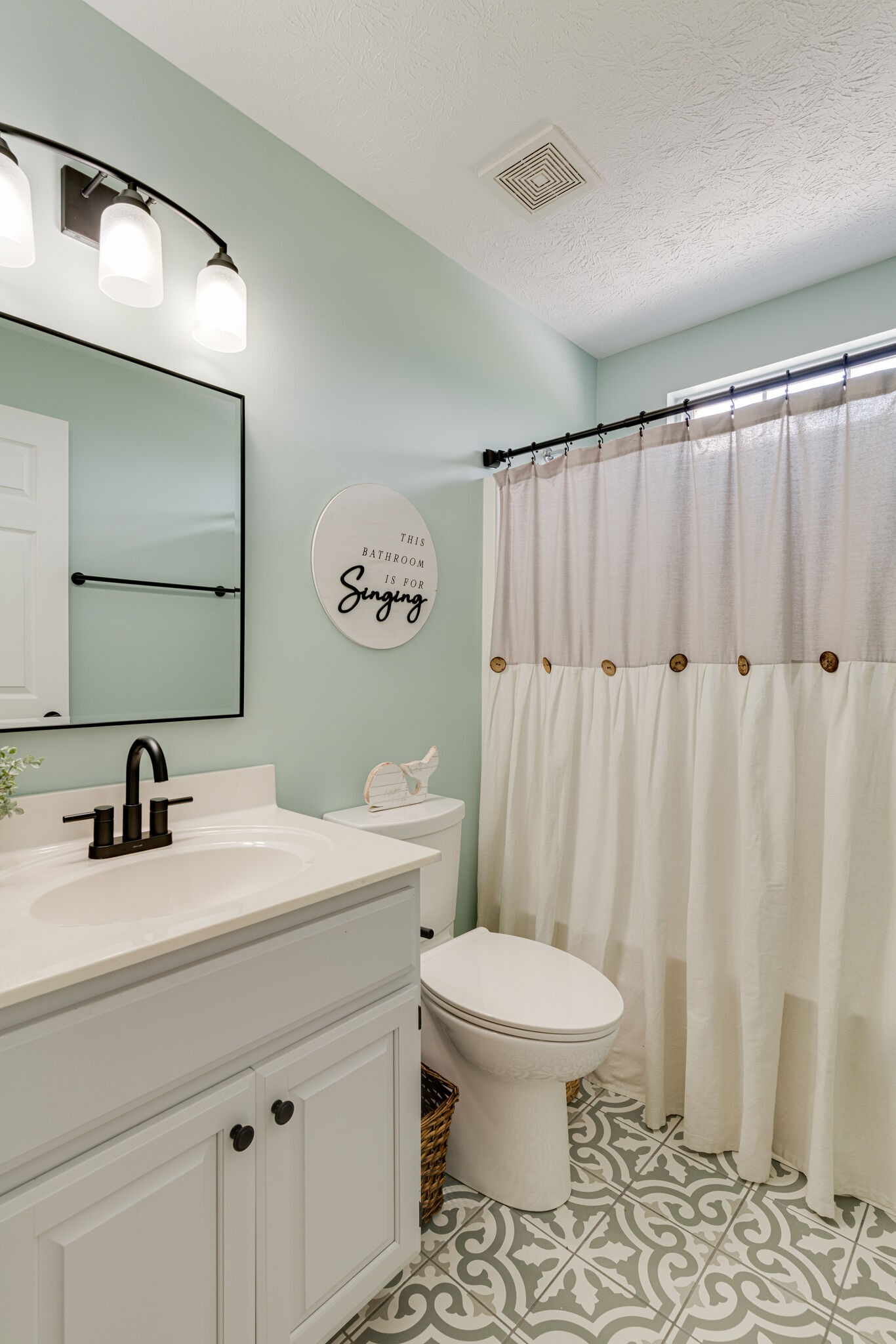 220 Old Martin Chapel Road Portland, TN 37148 - Photo 19 of 31 a bathroom with a sink a toilet and a mirror