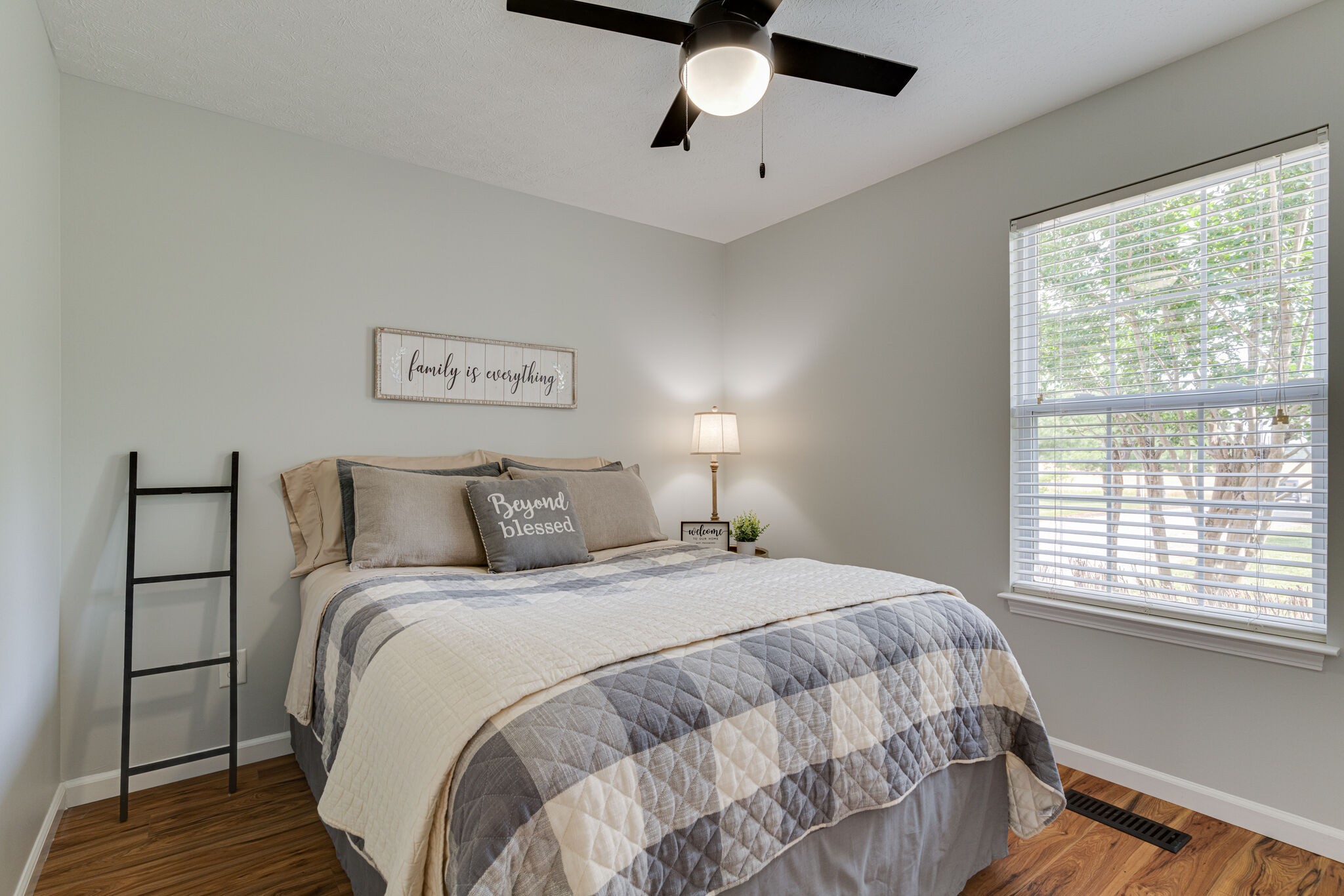 220 Old Martin Chapel Road Portland, TN 37148 - Photo 20 of 31 a bedroom with a large bed and a window