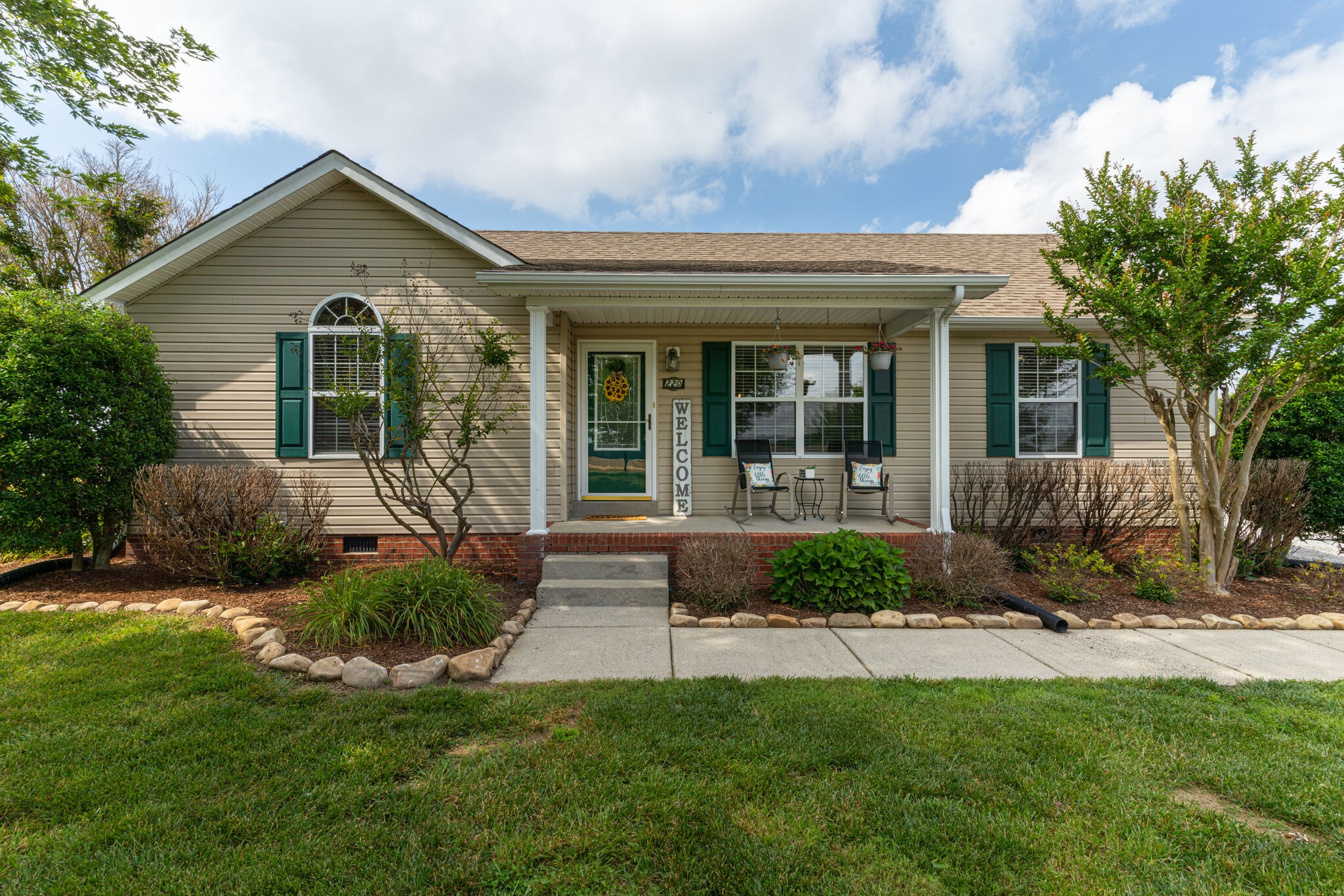 220 Old Martin Chapel Road Portland, TN 37148 - Photo 2 of 31 a front view of a house with a yard