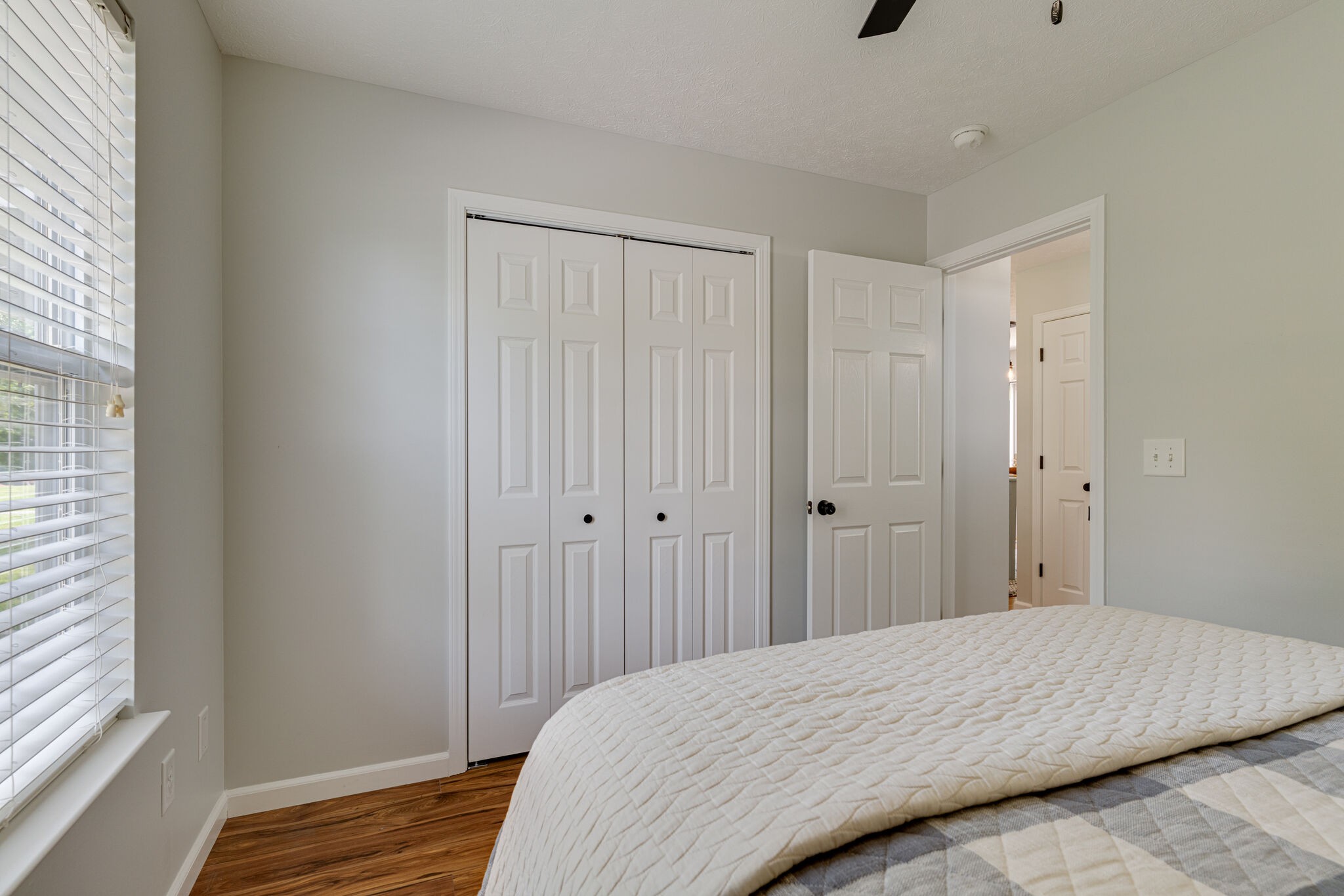 220 Old Martin Chapel Road Portland, TN 37148 - Photo 21 of 31 a bedroom with a bed and wooden floor