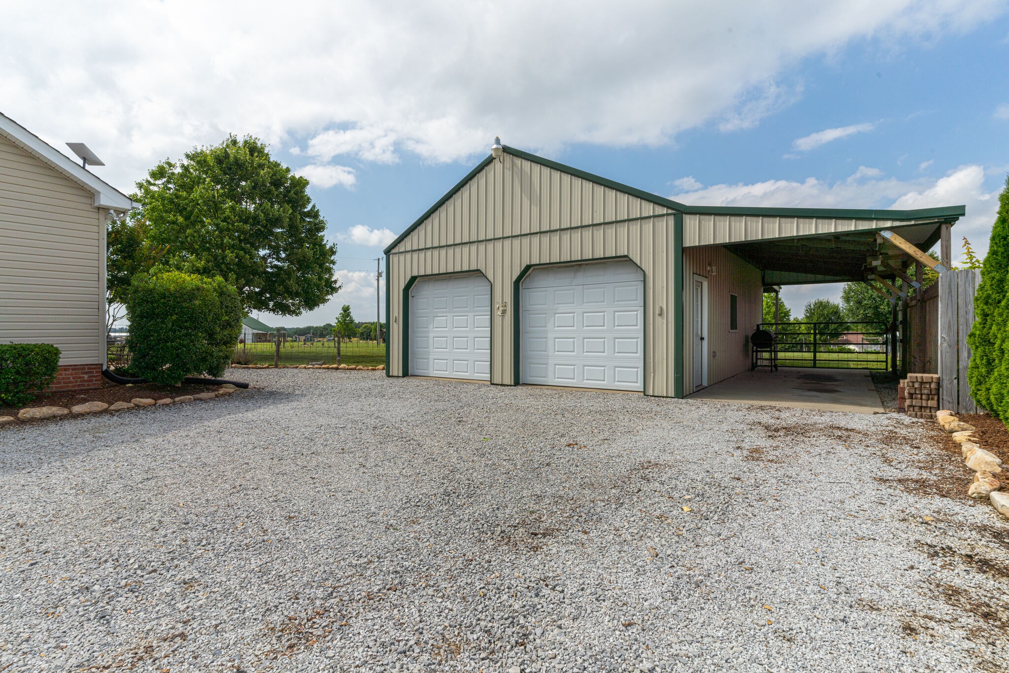 220 Old Martin Chapel Road Portland, TN 37148 - Photo 25 of 31 a view of a house with a yard and garage