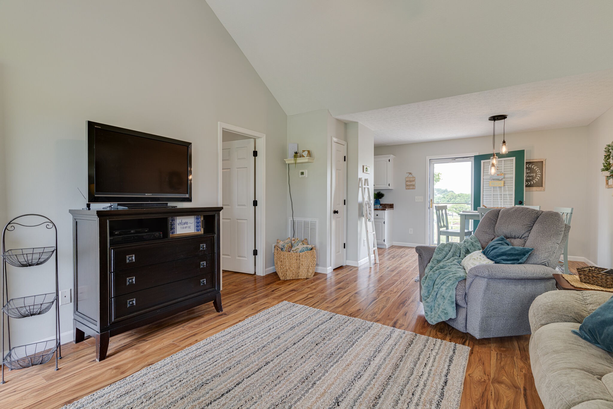 220 Old Martin Chapel Road Portland, TN 37148 - Photo 5 of 31 a living room with furniture and a flat screen tv