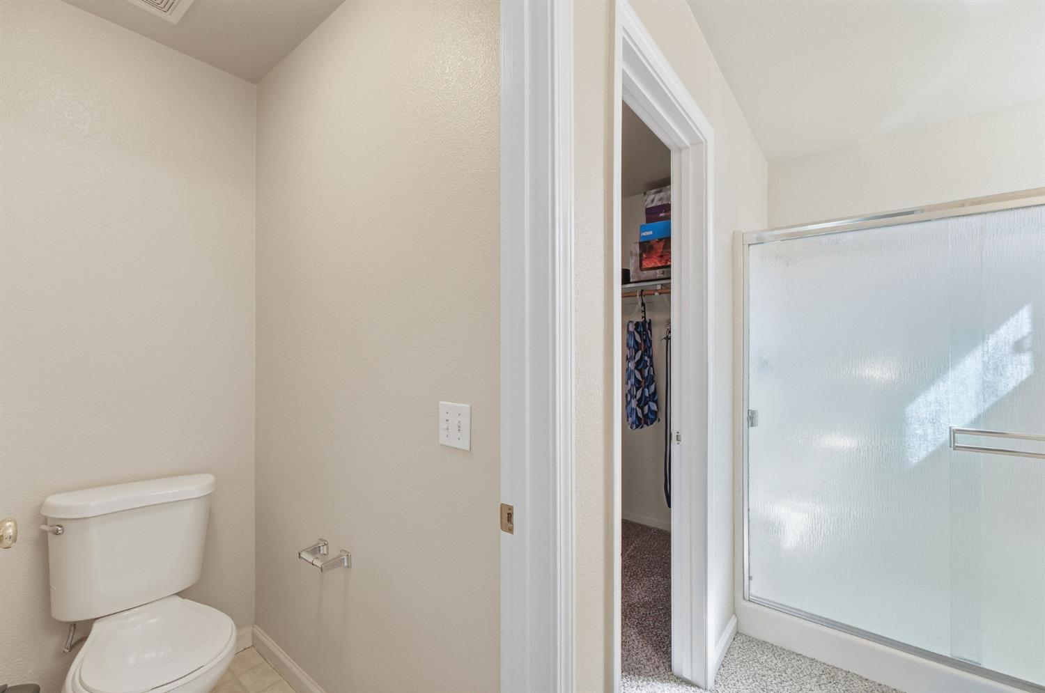 1933 Lifetime Drive Modesto, CA 95355 - Photo 24 of 38 a bathroom with a toilet and a sink