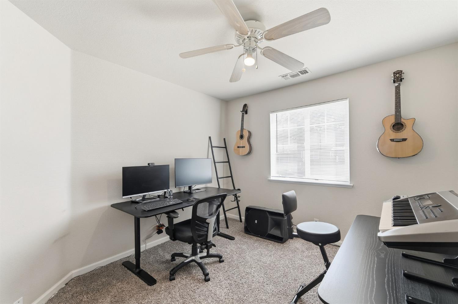 1933 Lifetime Drive Modesto, CA 95355 - Photo 30 of 38 a view of a workspace with furniture