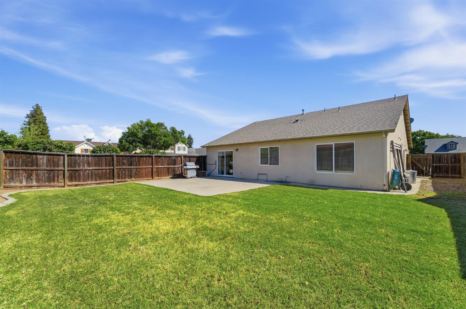 1933 Lifetime Drive Modesto, CA 95355 - Photo 36 of 38 a view of a backyard with a garden and plants