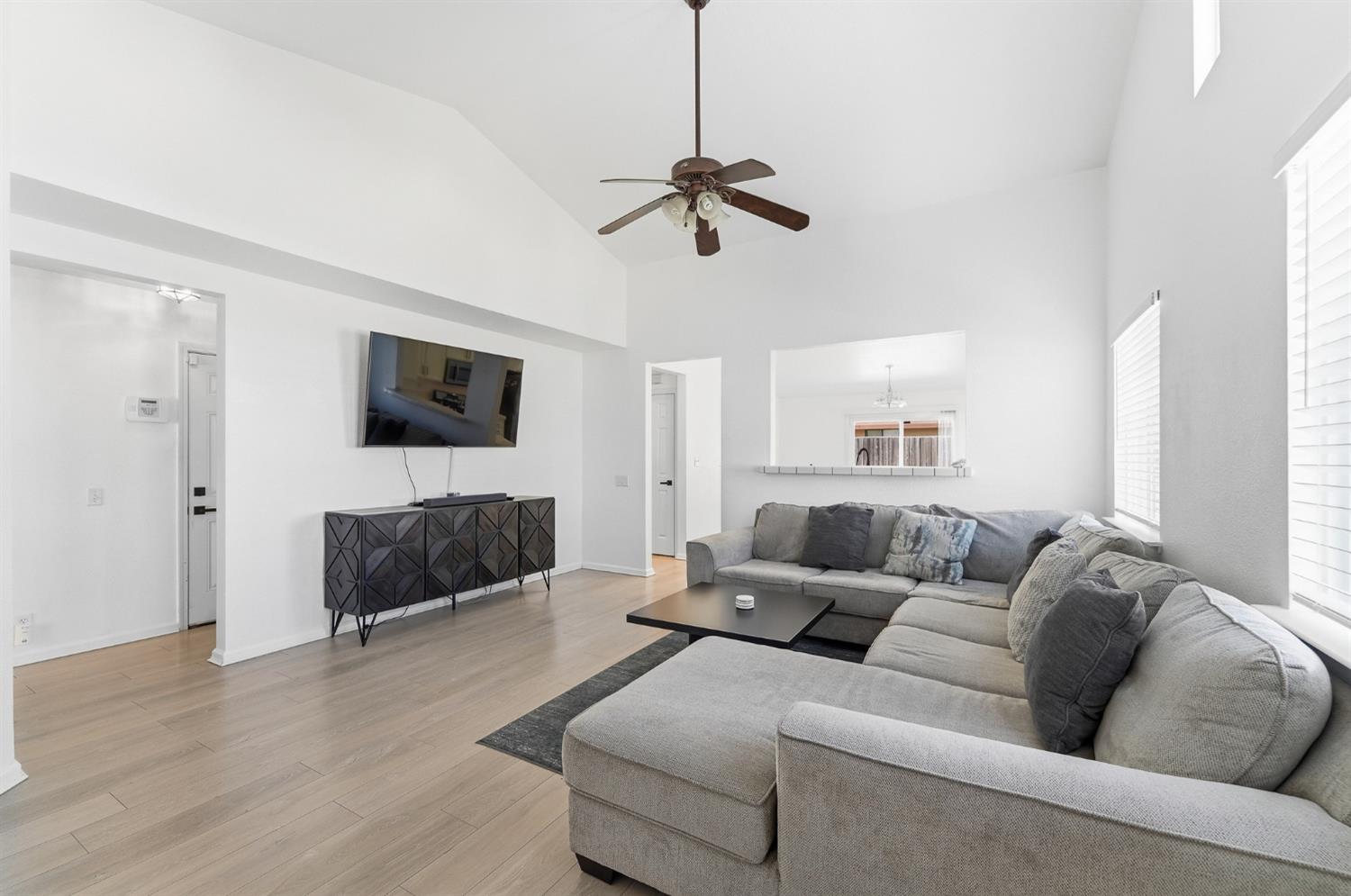 1933 Lifetime Drive Modesto, CA 95355 - Photo 6 of 38 a living room with furniture and a flat screen tv