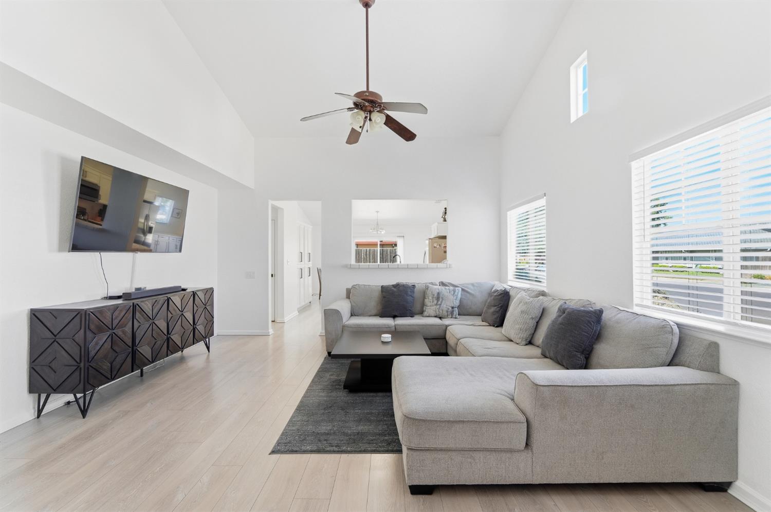 1933 Lifetime Drive Modesto, CA 95355 - Photo 8 of 38 a living room with furniture ceiling fan and a window