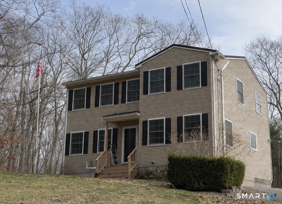 79 All Hallows Road Plainfield, CT 06239 - Photo 2 of 5 a front view of a house with garden
