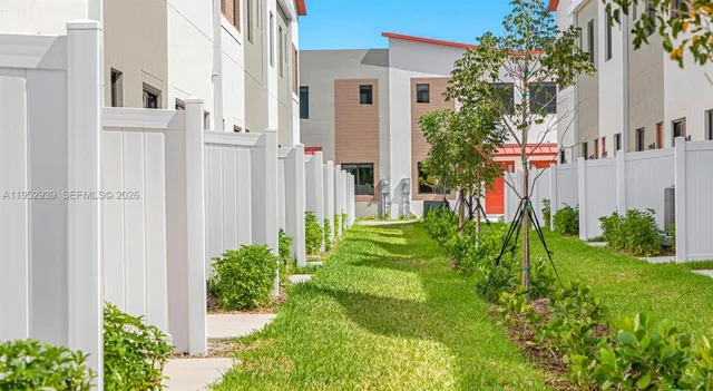 a view of a back yard of the house