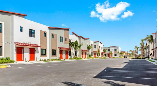 a front view of building with street