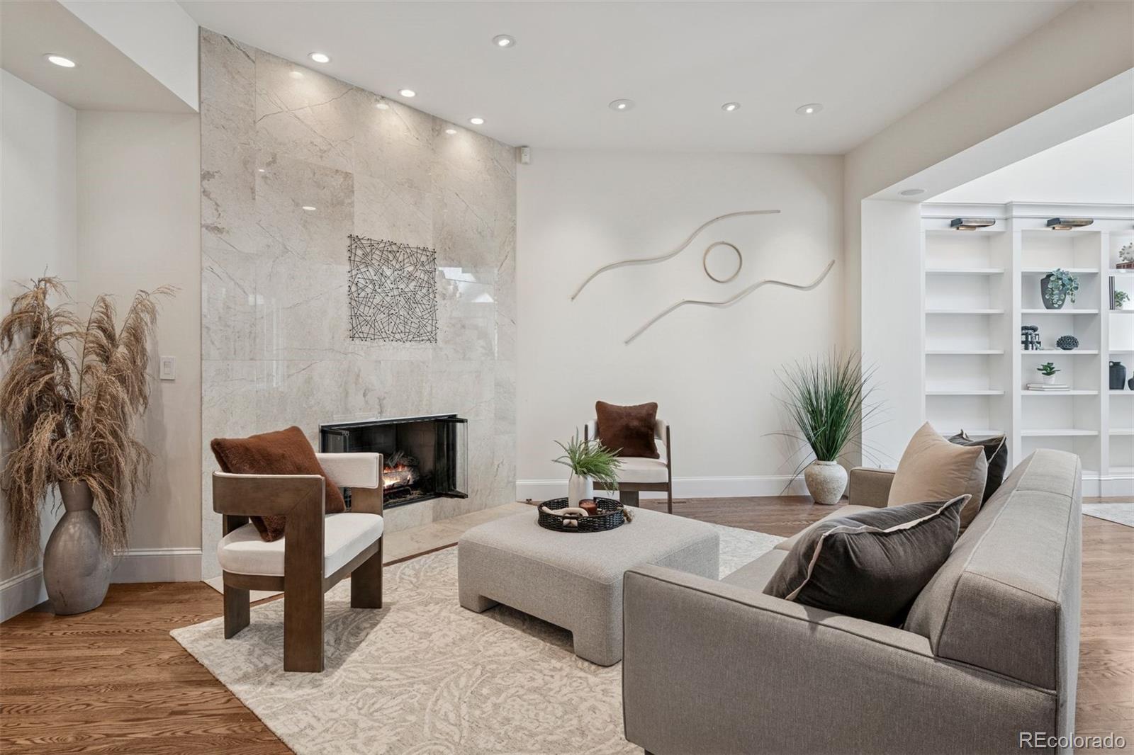 375 Clayton Street Denver, CO 80206 - Photo 20 of 45 a living room with furniture or couch and a potted plant