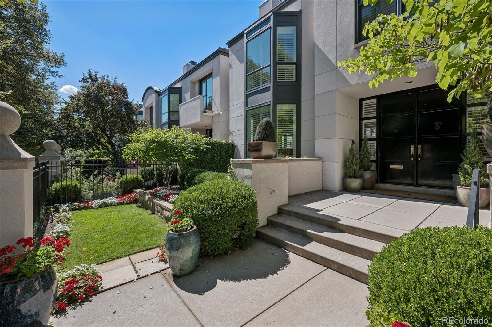 375 Clayton Street Denver, CO 80206 - Photo 41 of 45 a view of a house with a garden