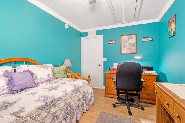 a bathroom with a toilet and a shower curtain