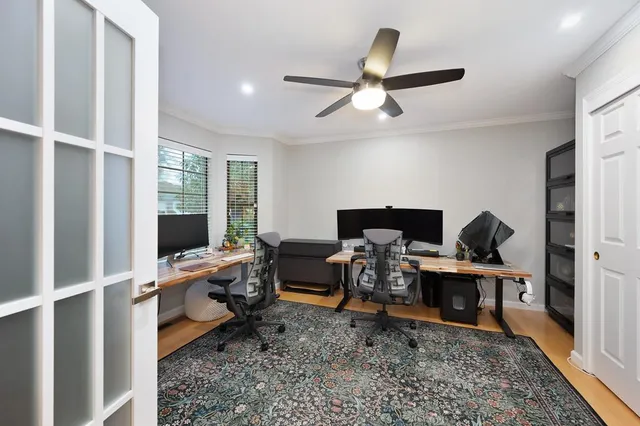 a view of a balcony with furniture