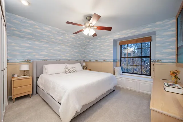 a room with gym equipment and view of living room