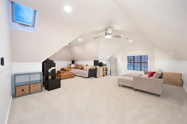 a front view of house with a garden and patio