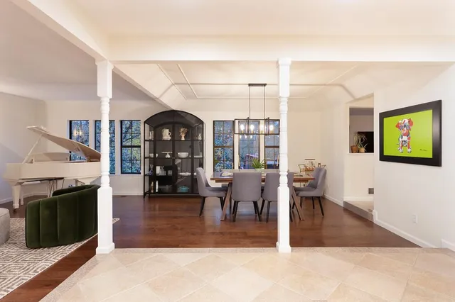a view of a livingroom with furniture and a fireplace