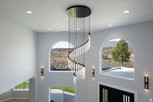 476 Spring Drive Toquerville, UT 84774 - Photo 34 of 95 Foyer entrance featuring plenty of natural light, a high ceiling, a mountain view, and recessed lighting