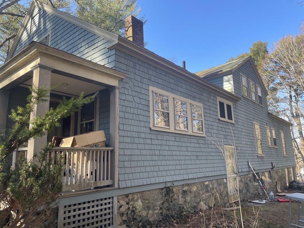 49 Garrison Road Hingham, MA 02043 - Photo 2 of 3 a view of a house with a yard