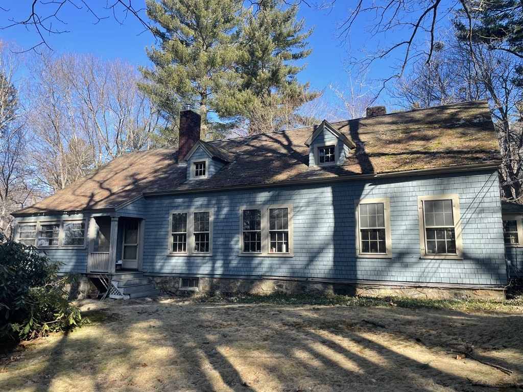 49 Garrison Road Hingham, MA 02043 - Photo 3 of 3 a front view of a house with a yard