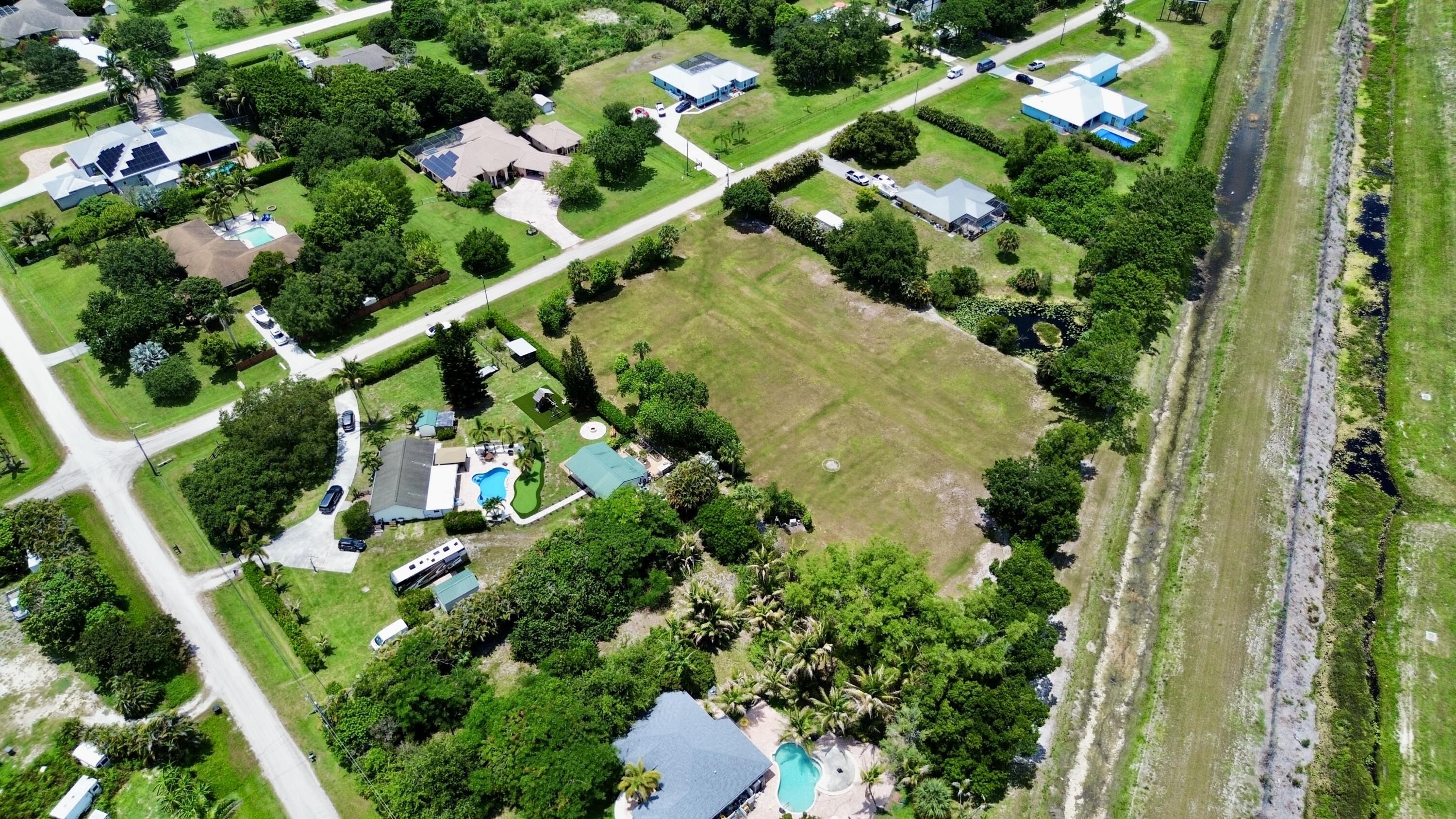 16546 74th Avenue North West Palm Beach, FL 33418 - Photo 3 of 16 dji_fly_20260620_145552_718_178198261911