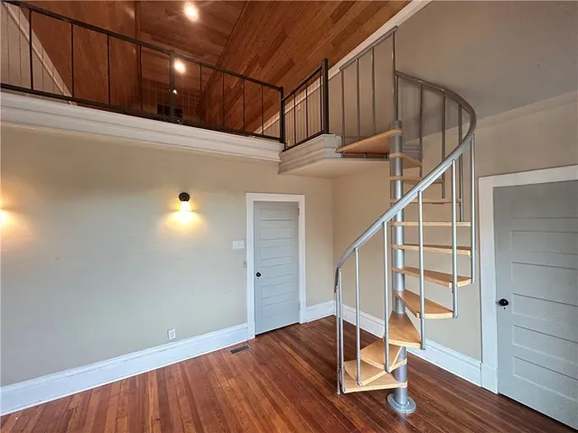 a view of entryway with wooden floor