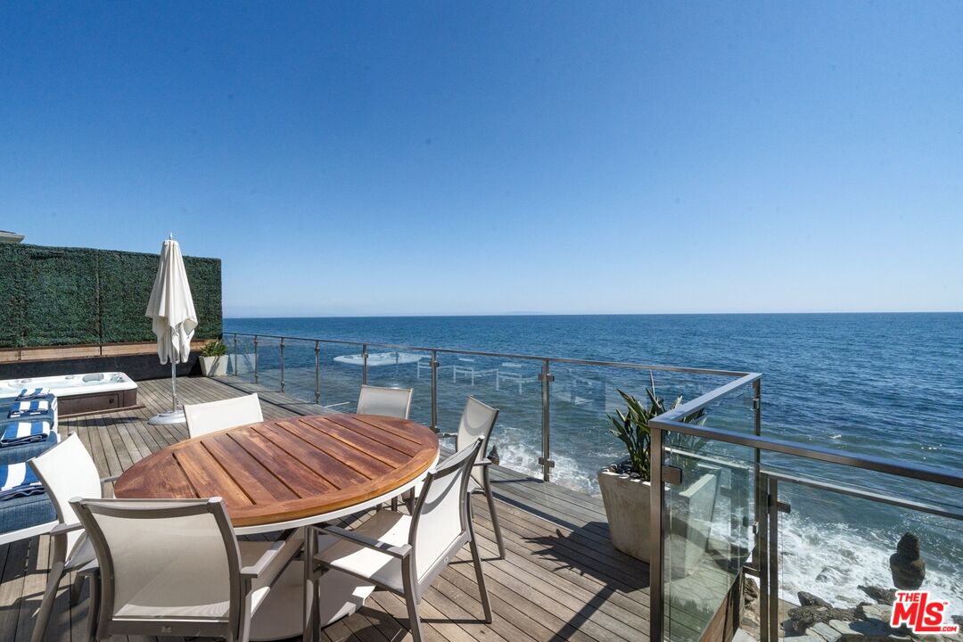 24380 Malibu Road Malibu, CA 90265 - Photo 19 of 50 a view of a terrace with seating area