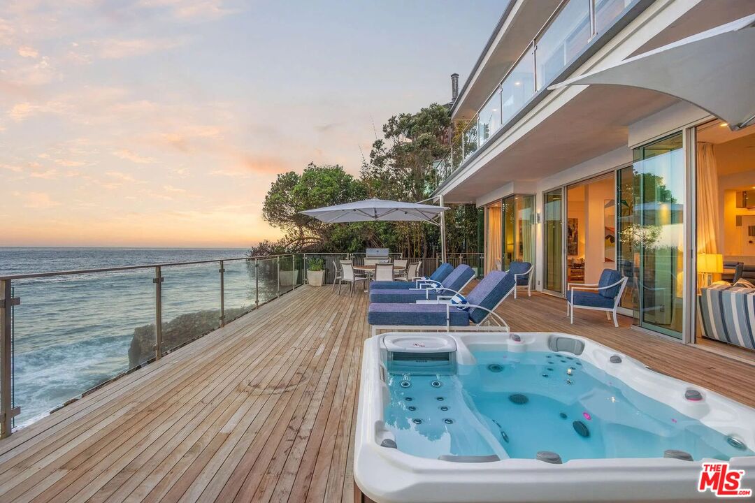 24380 Malibu Road Malibu, CA 90265 - Photo 2 of 48 swimming pool view with a seating space