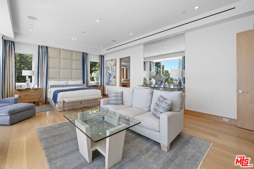 24380 Malibu Road Malibu, CA 90265 - Photo 24 of 48 a living room with furniture and a large window