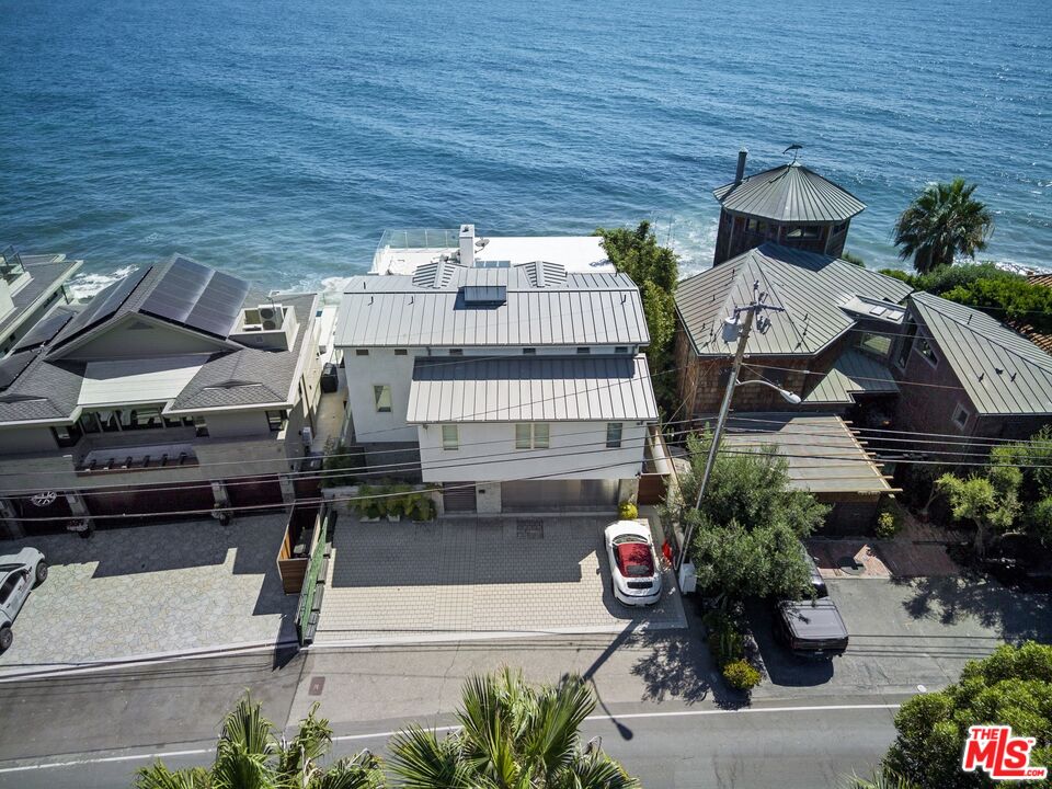 24380 Malibu Road Malibu, CA 90265 - Photo 47 of 48 a front view of a house with a garden
