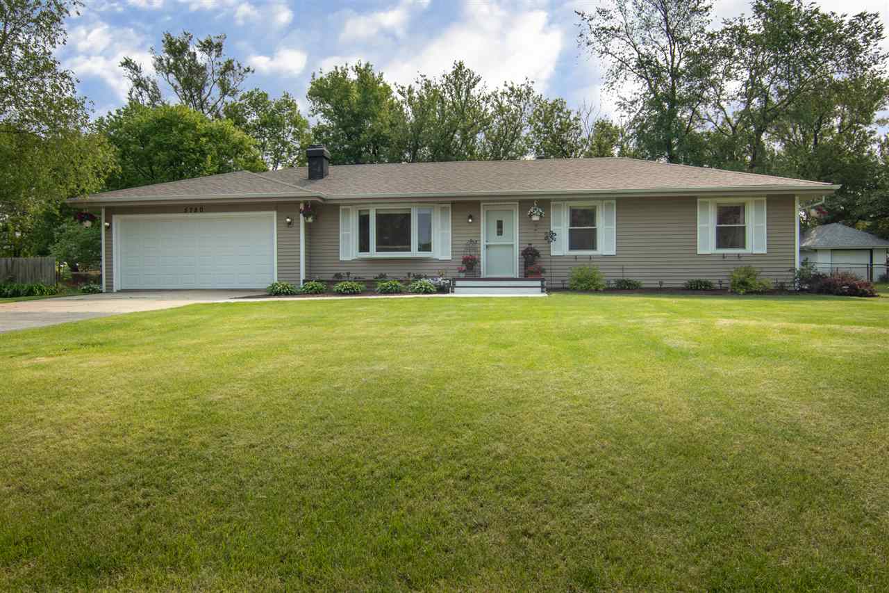 5780 Rural Edge Drive Roscoe, IL 61073 - Photo 1 of 25 a view of a house with swimming pool