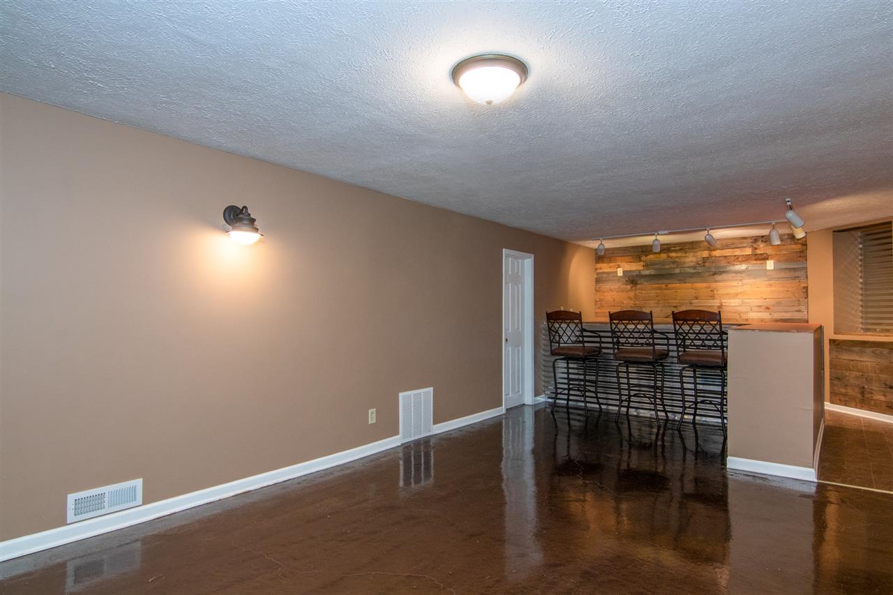5780 Rural Edge Drive Roscoe, IL 61073 - Photo 18 of 25 an empty room with wooden floor and windows