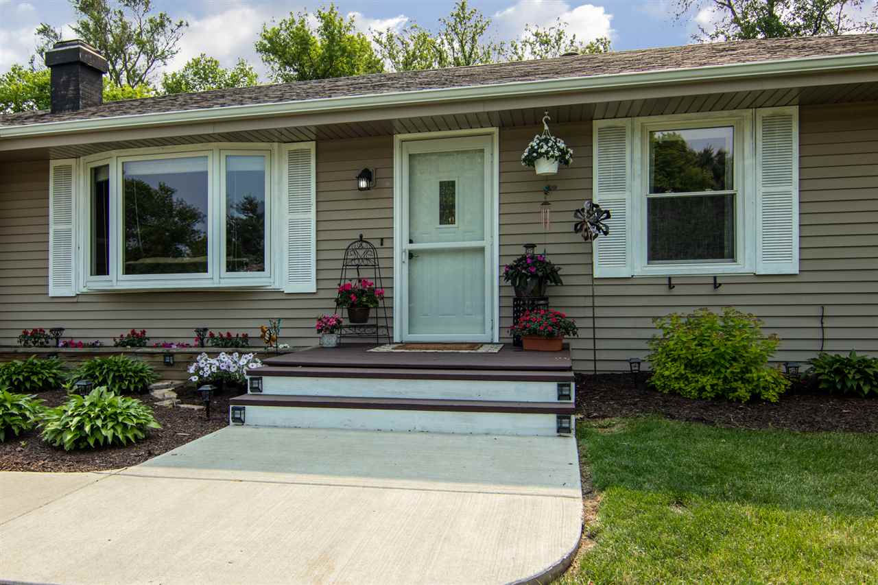 5780 Rural Edge Drive Roscoe, IL 61073 - Photo 2 of 25 a view of house with a outdoor space