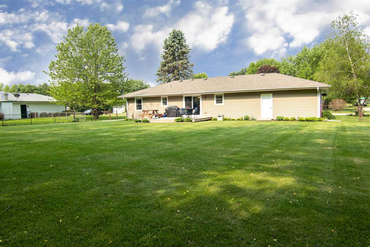 5780 Rural Edge Drive Roscoe, IL 61073 - Photo 25 of 25 a front view of a house with a garden