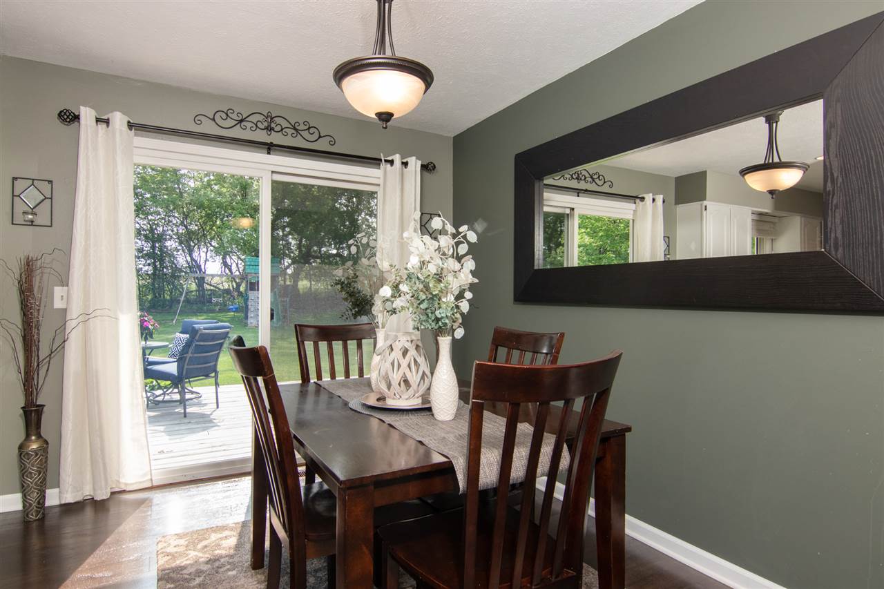 5780 Rural Edge Drive Roscoe, IL 61073 - Photo 8 of 25 a view of a dining room with furniture window and outside view