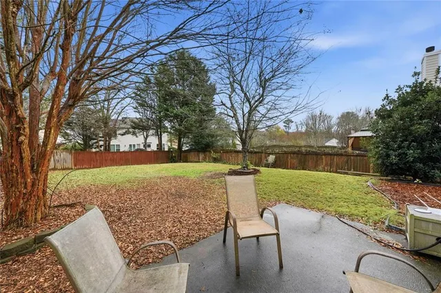 a view of a garden with trees